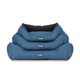 A stack of three sizes of the Scruffs Expedition box bed for pets.