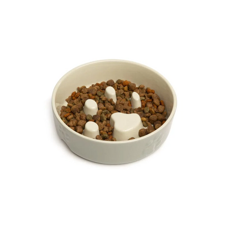 Kibble inside of a light grey Scruffs ceramic slow feeder bowl for dogs.