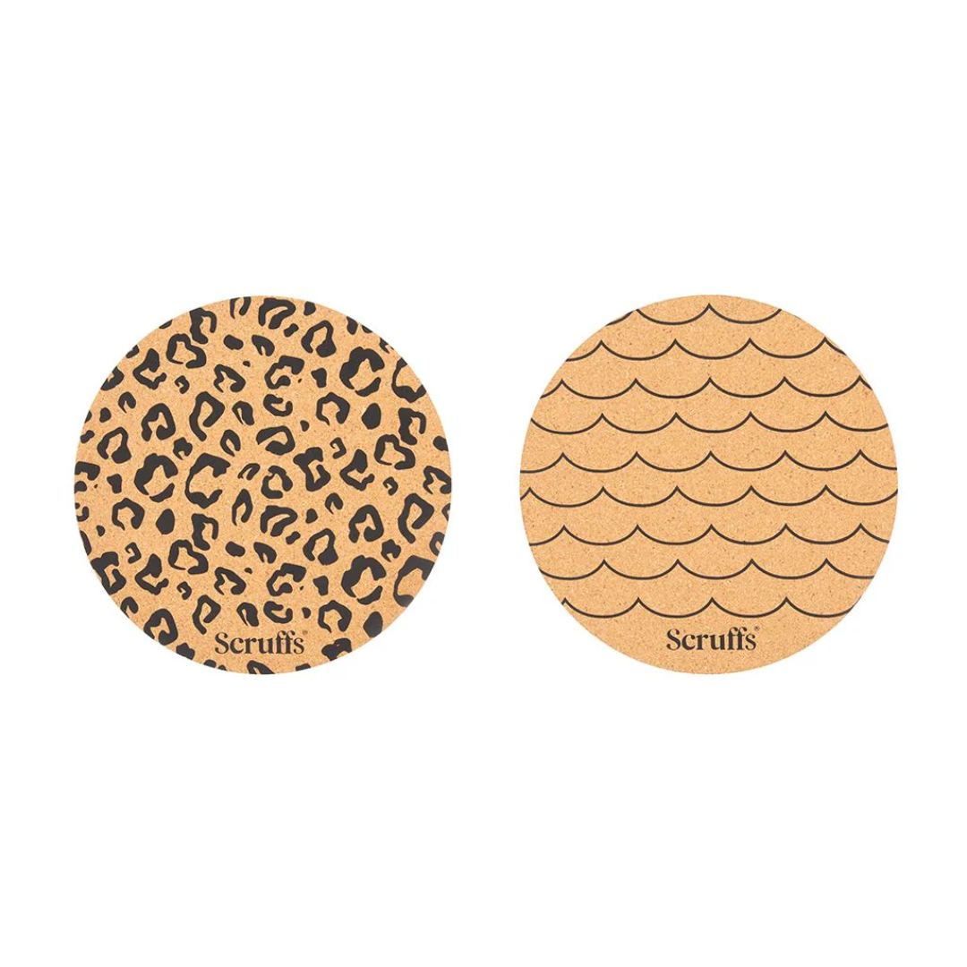 Scruffs eco placemats, one with a wave design, and one with a leopard print design.