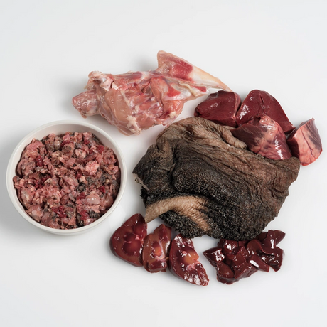 Raw ingredients in Paleo Ridge Beef heart, tripe and chicken raw dog food.