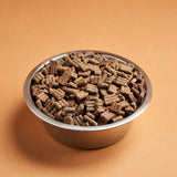 Darf Cold Pressed Turkey dog food in a stainless steel bowl.