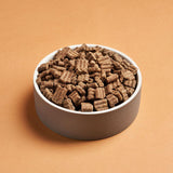 Darf Beef Cold Pressed Dog Food in a white ceramic bowl.