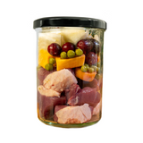 Raw ingredients in a jar, of Fidelis Duck Menu wet dog food.