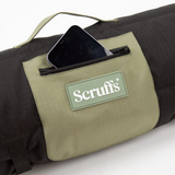 Phone inside the pocket of the Scruffs Expedition Roll Up Travel Bed