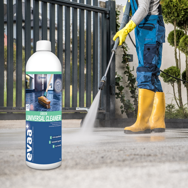 Person power washing concrete with a bottle of Provilan Green Probiotic Universal Cleaner
