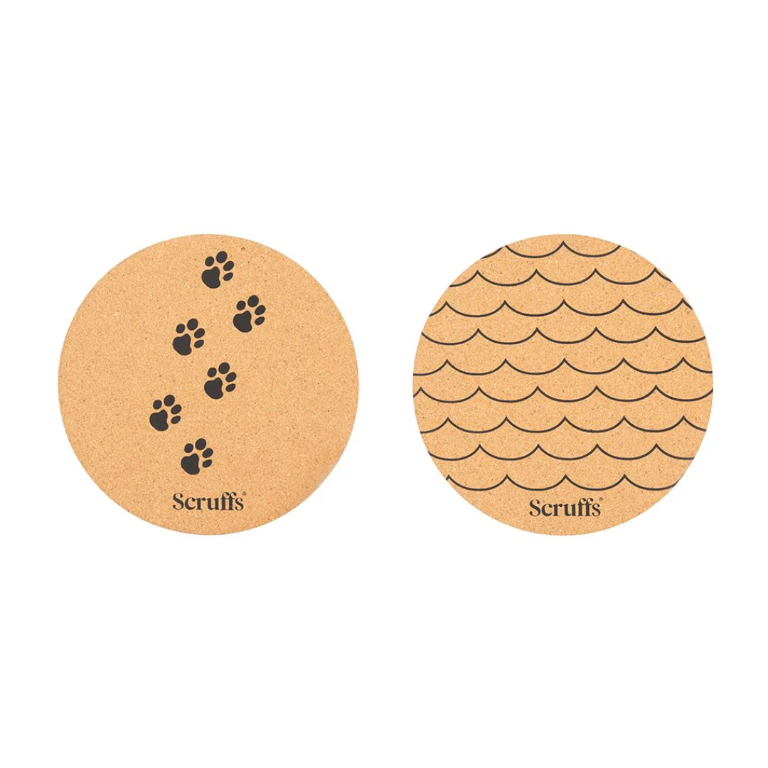 Scruffs eco placemats, one with a wave design, and one with a paw print design.