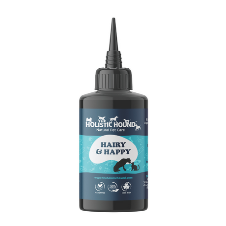 Bottle of Holistic Hound Hairy & Happy, formerly Ticked Off, flea and tick repellant for pets.