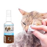 Cat having it's eye cleaned and a bottle of Provilan Lucaa plus Probiotic Eye Care spray.