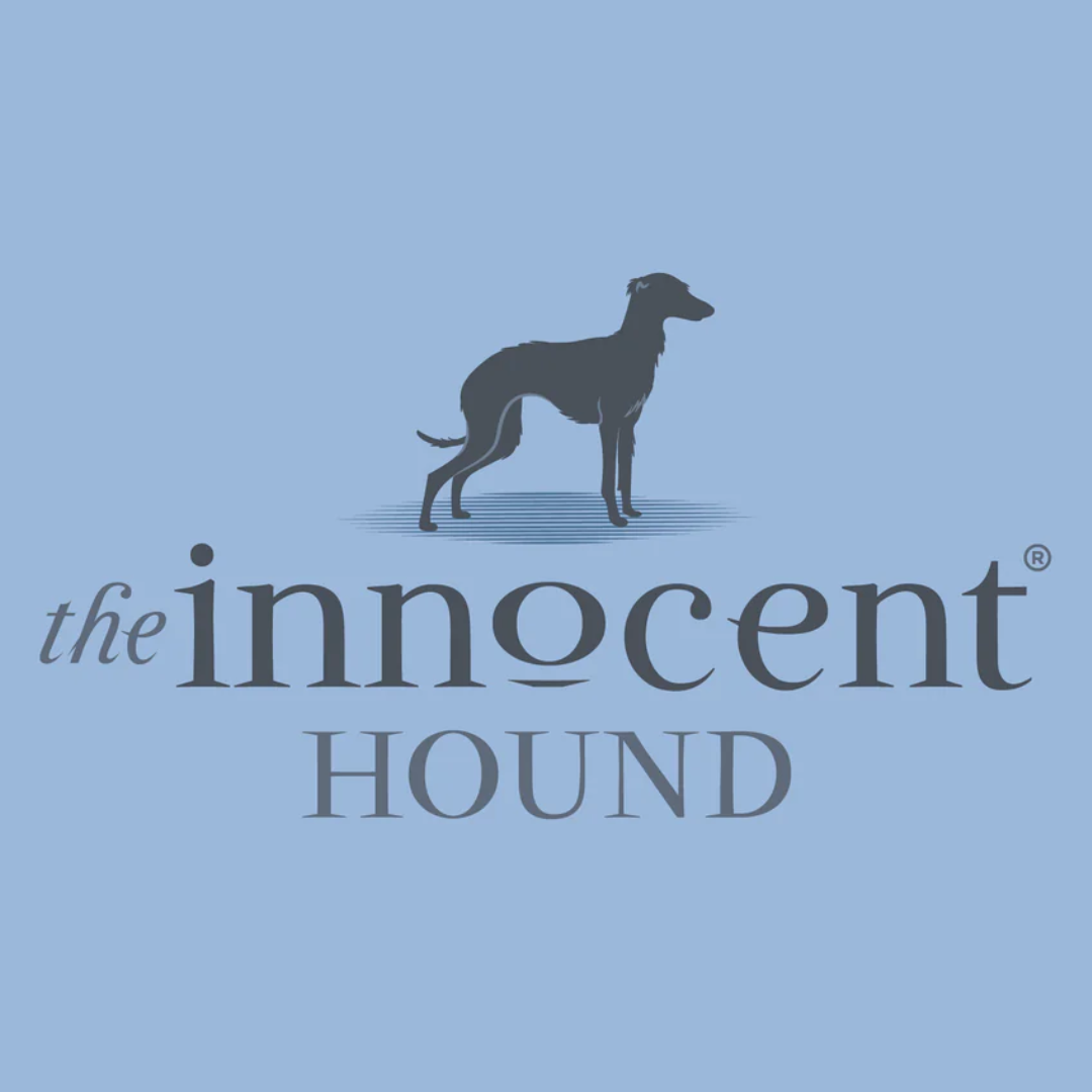 The Innocent Hound Logo on a blue background.