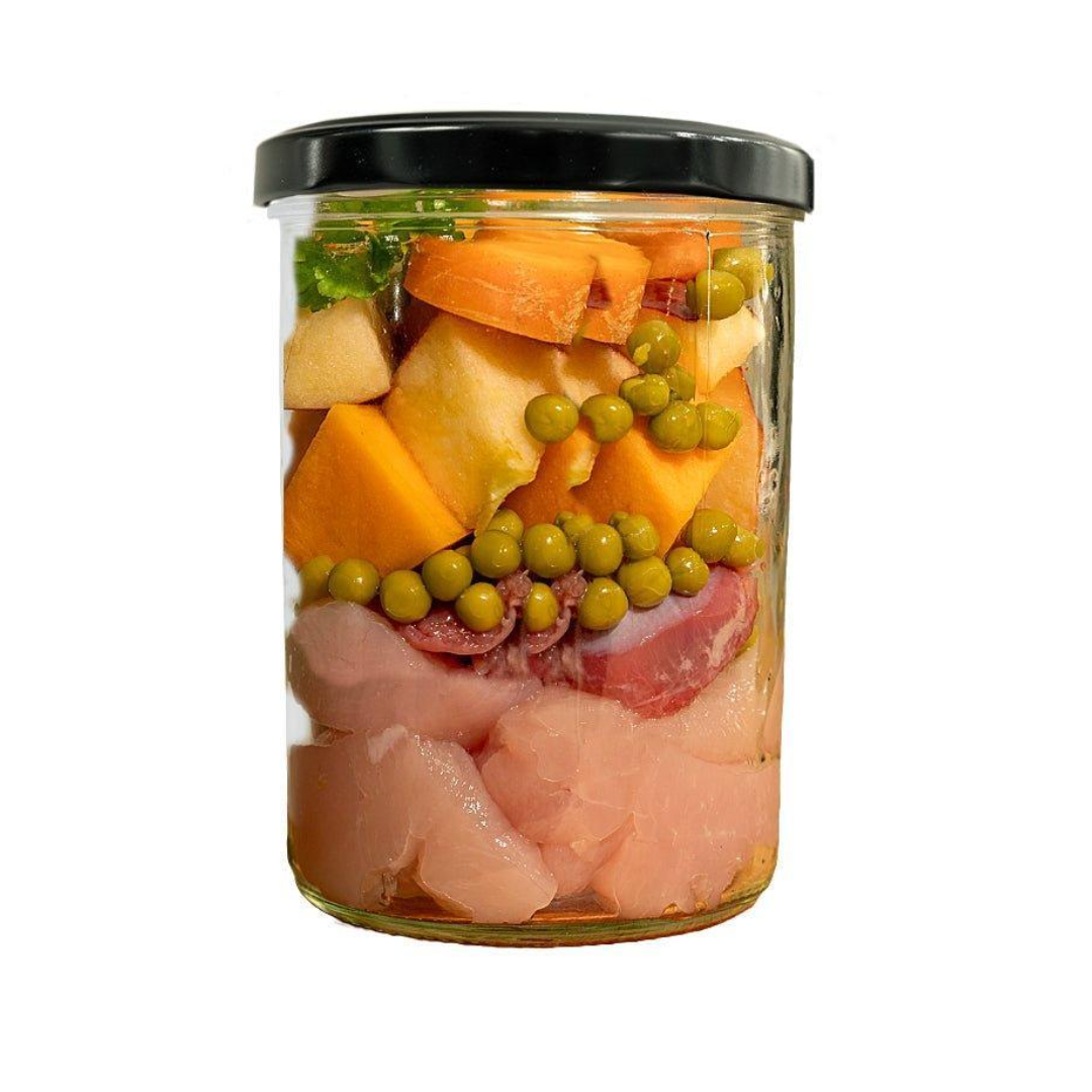 Jar of raw ingredients of Fidelis Chicken Menu wet dog food.